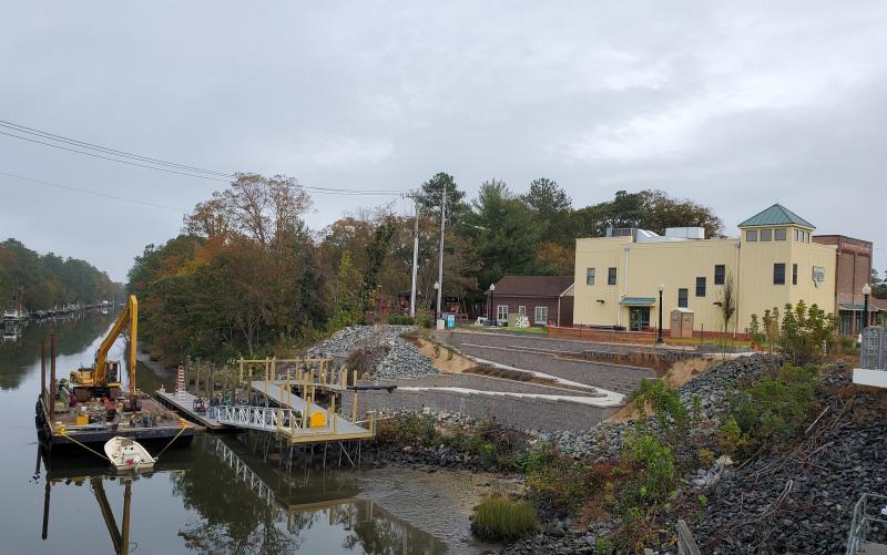 This photo shows how at low tide, not much beyond a stand-up paddleboard, kayak or canoe would be able to use the dock.